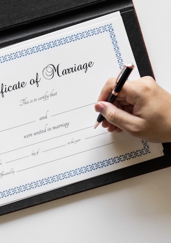Hand signing on marriage certification Hand signing on marriage certification